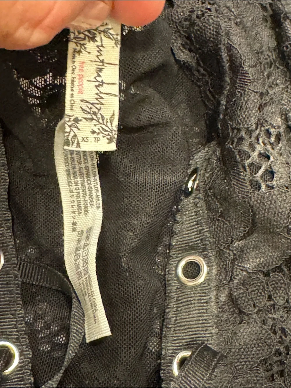 Free People lace bodysuit features a distinct lace-up front detail 1193